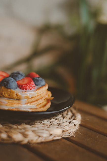 Food Aesthetics - Stack of pancakes topped with fresh strawberries #14716736