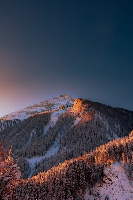 Mountain Landscapes - A stunning winter evening view of snow-covered m #20074935