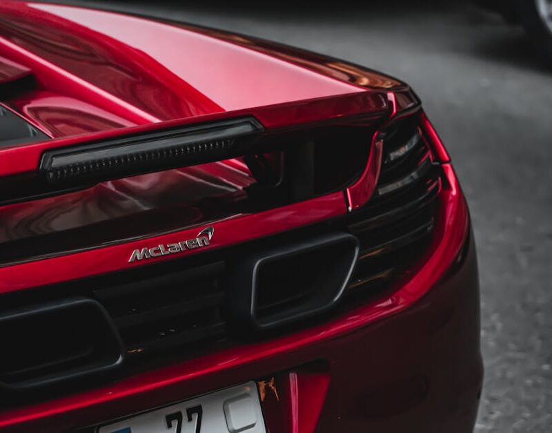 Luxury Cars - Elegant rear view of a red McLaren MP4-12C super #20743620