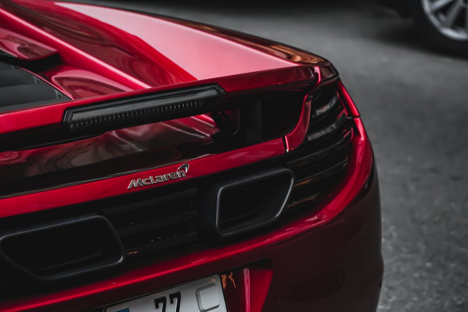 Luxury Cars - Elegant rear view of a red McLaren MP4-12C super #20743620