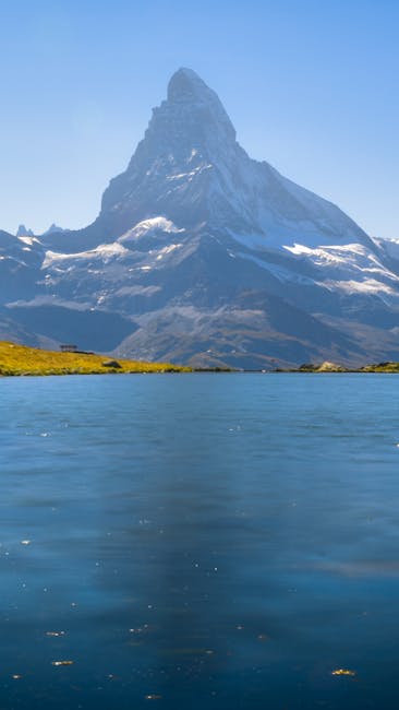 Mountain Landscapes - Breathtaking view of Matterhorn reflecting in a  #27436135