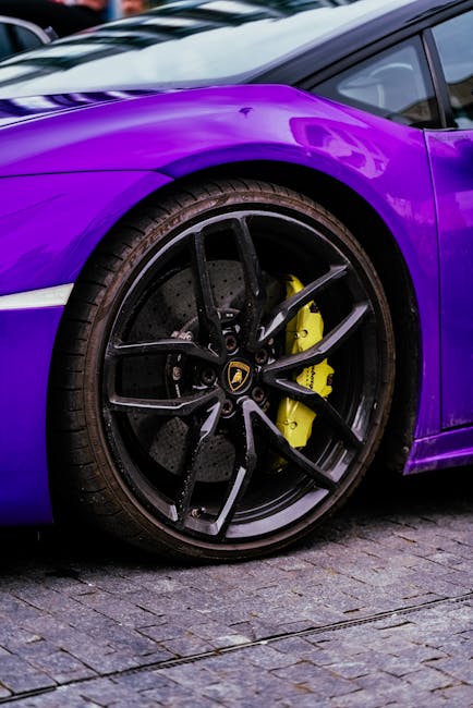Luxury Cars - Detailed view of purple luxury sports car wheel  #32364025