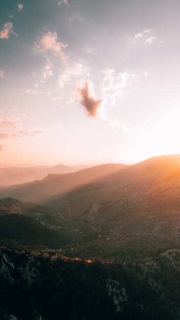 Mountain Landscapes - Breathtaking aerial view of a sunset over the mo #32569417