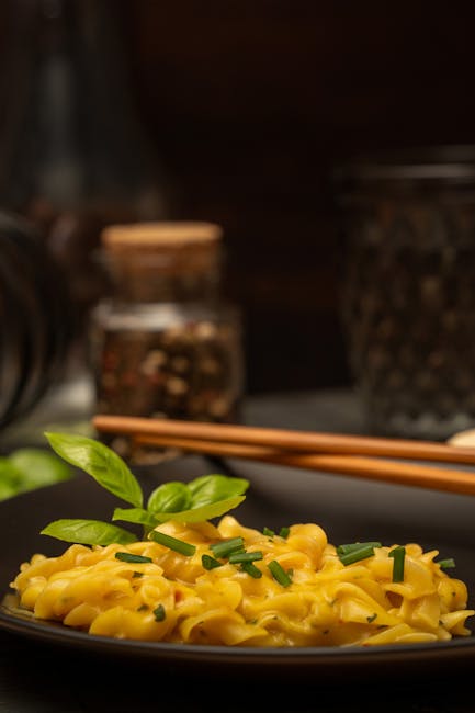 Food Aesthetics - Creamy pasta dish presented with basil and chive #33911269