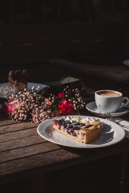 Food Aesthetics - Delightful berry tart served with coffee and flo #35121848