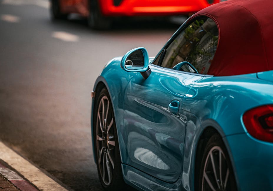 Luxury Cars - Vibrant blue sports car parked on a street in Ba #36703709