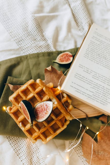 Food Aesthetics - Warm waffles topped with fresh figs, set on a te #5377451