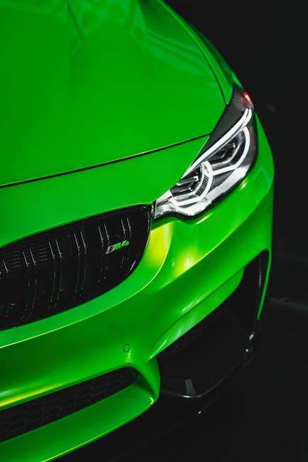 Luxury Cars - Close-up of a vibrant green sports car with focu #6597509