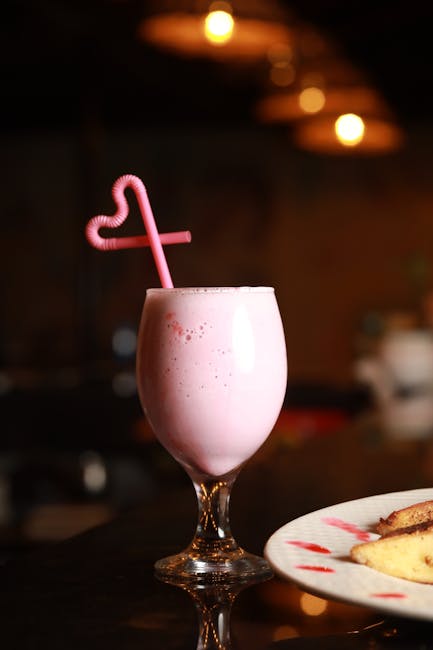 Food Aesthetics - A tempting strawberry milkshake in a glass with  #6705482